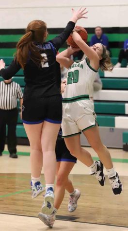 Harlan guard Emma Owens worked for a shot in Tuesdays game against Letcher Central. Owens scored 26 points but the Lady Dragons fell 71-66.