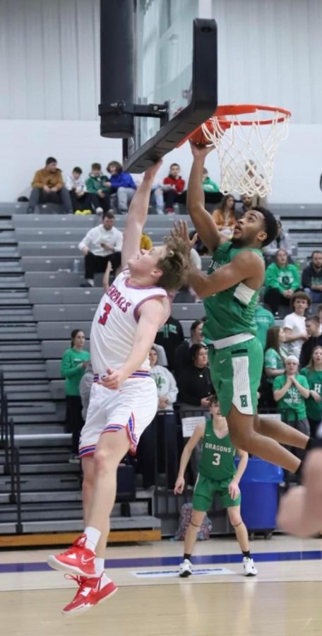 Harlan senior forward Jaedyn Gist went up against Jackson Countys Tydus Summers in the 13th Region All A Classic championship game Tuesday. Gist scored 10 points in the Dragons 78-46 win.