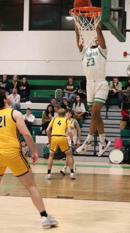 Harlan senior forward Jaedyn Gist went up for one of his dunks during the Green Dragons 100-51 win Friday over visiting Middlesboro. Gist scored 25 points.