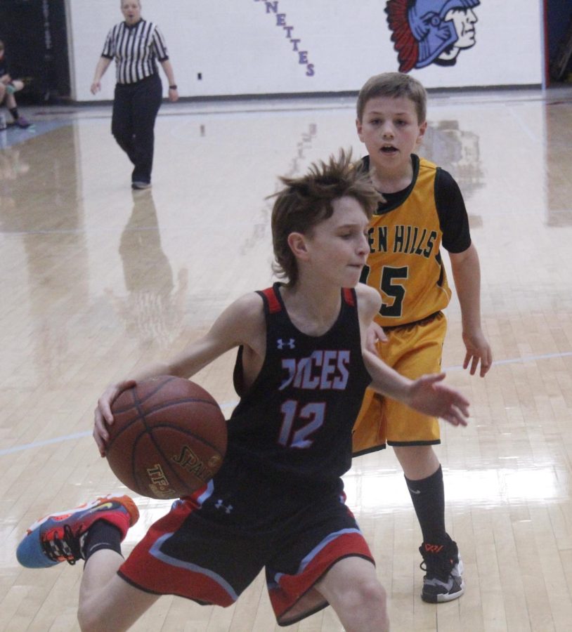 James A. Cawood guard Easton Engle drove to the basket in Saturdays win over Green Hills in the fifth- and sixth-grade county tournament.