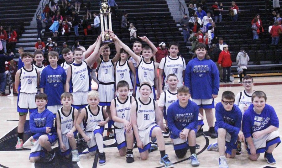 The Rosspoint WIldcats are pictured with the championship trophy after defeating James A. Cawood 49-30 on Thursday in the tournament finals at Harlan County High School.