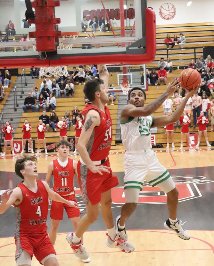 Harlan senior forward Jaedyn Gist, pictured in action earlier this season, scored 28 points on Thursday in the Green Dragons 95-48 win at Knox Central.