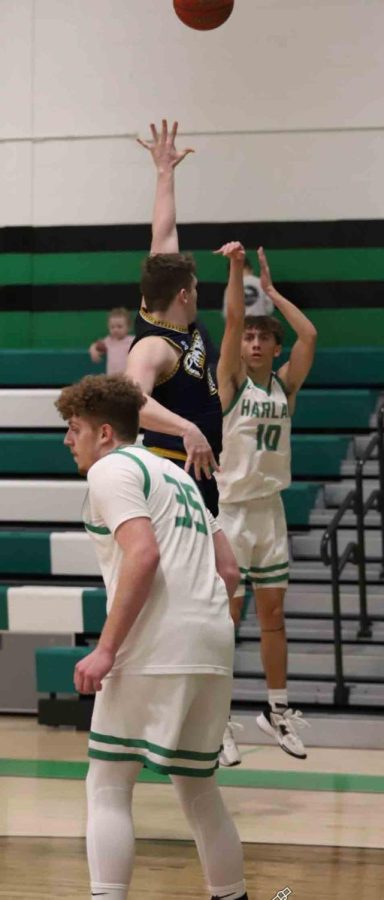 Harlan freshman guard Dylan Cox put up a 3-pointer in the Dragons 107-83 win Thursday over visiting Knox Central. Harlan hit 23 3-pointers and attempted 68, both among the highest in Kentucky history.