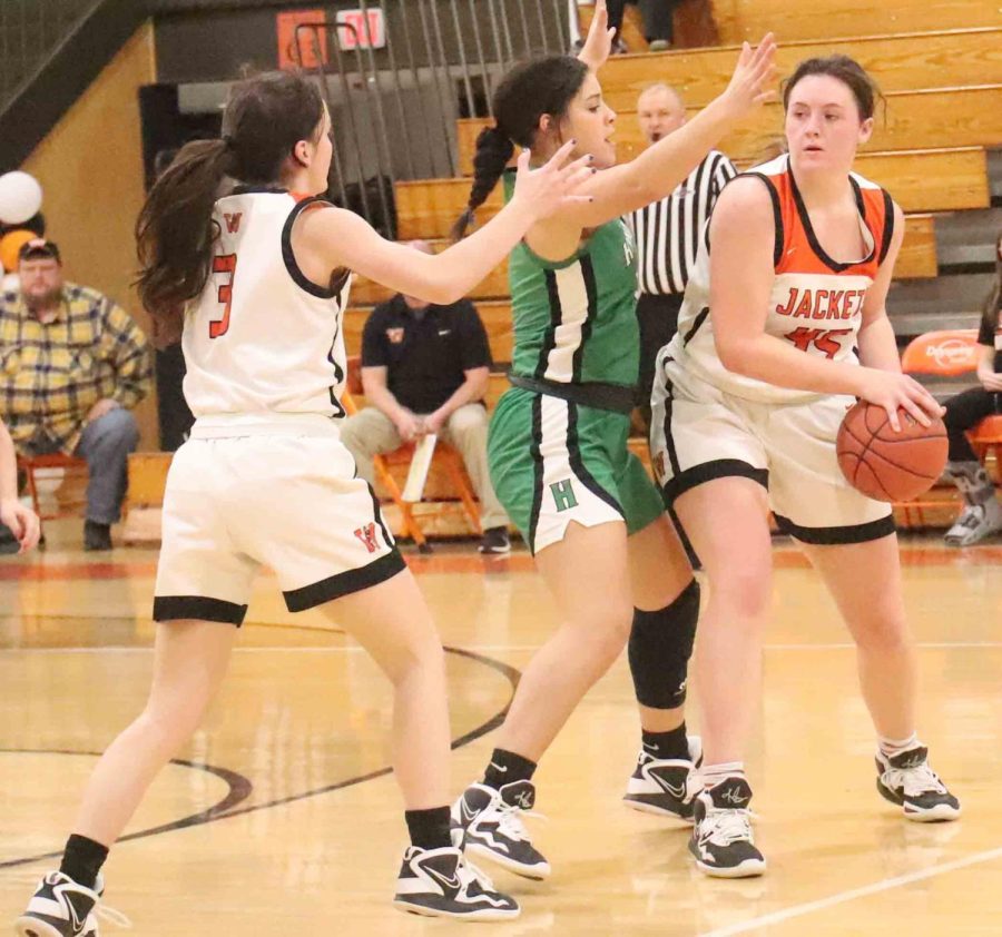 Harlans Kylie Noe pressured Williamsburg center Allie Wilson in Mondays game. Noe scored 36 points in the Lady Dragons 70-64 victory.