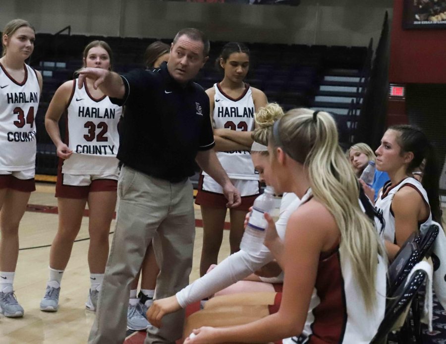 Harlan County coach Anthony Nolan talked to the Lady Bears during a timeout Friday. The Lady Bears improved to 19-6 with 67-29 win over visiting Middlesboro.