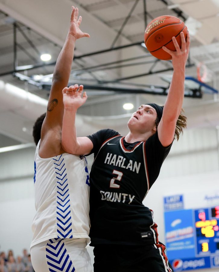 Harlan County guard Trent Noah worked inside for a shot over Barbourvilles K.T. Turner on Thursday. Noah had 40 points and 16 rebounds in the Bears 75-70 victory.