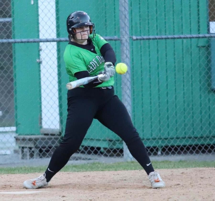 Harlan first baseman Abbi Fields connected on a pitch in Thursdays district clash against Middlesboro. Fields hit her second home run of the season with a two-run blast in the sixth inning of an 18-8 loss.