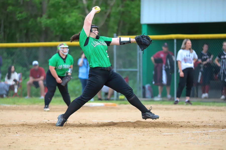 Harlan sophomore Carley Thomas delivered a pitch in action last season.