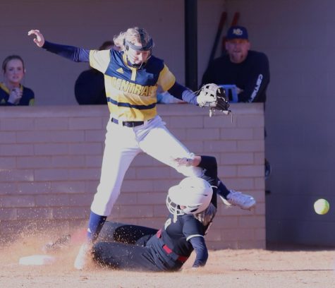 Harlan Countys Hailey Austin slid into third base in action earlier this season. Austin had one of the Lady Bears four hits in a 2-1 loss Thursday at Clay County.