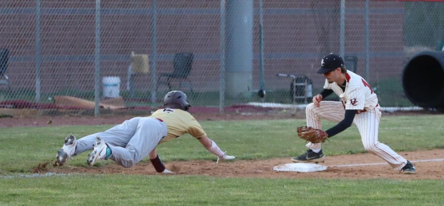 Harlan County third baseman Samuel Henson tagged Leslie Countys Caden Shepherd to complete a triple play in the second inning of Mondays game. The Black Bears improved to 2-0 with a 10-3 win.