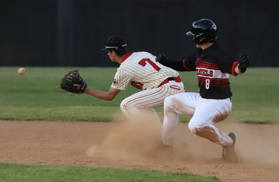 Whitley County's Mason Croley beat the throw to Harlan County infielder Alex Creech in Thursday's game. The visting Colonels coasted to a 16-0 victory.