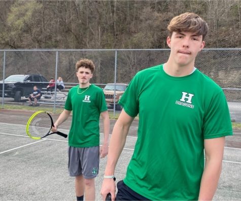 Harlans Kelson Napier and Derek Pruitt won.a double match on Thursday against Pineville as the Green Dragons swept all their matches in both boys and girls tennis.