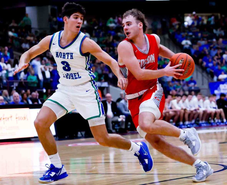 Corbin guard Carter Stewart drove against North Laurels Reed Sheppard in the 13th Region Tournament. Stewart and the Hounds will again be among the favorites in the 2023-2024 season.