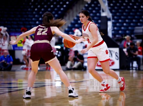 Corbin guard Kallie Housley worked toward the basket in 13th Region Tournament action. Housley and the Lady Hounds will be among the favorites to win the region in 2024.