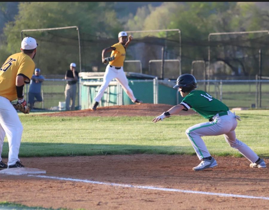 Harlans Jake Brewer headed back to first base as Middlesboro pitcher Kam Wilson threw over during Tuesdays district clash. The Jackets avenged a 4-3 loss from a night earlier with a 10-4 victory.