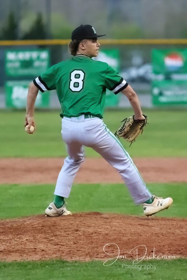 Harlans Luke Luttrell, pictured in action earlier this season, tossed a three-hitter Monday as the Green Dragons downed visiting Bell County 8-2.