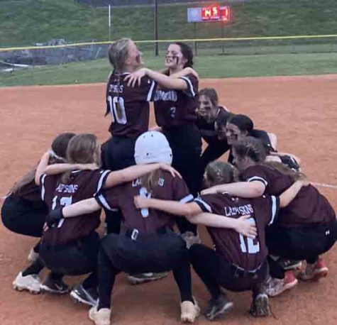 The Cumberland Lady Skins celebrated after a 14-1 victory Thursady over Barbourville.