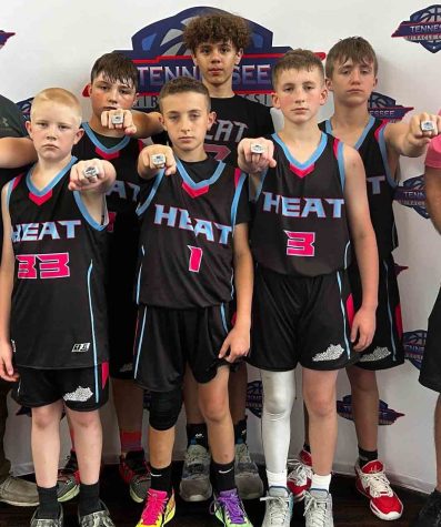 Harlan County Heat took on some of the top fifth graders in the nation over the weekend and emerged as champions of the U.S. Amateur Regional State Championship tournament at the Knoxville Convention Center. The Heat defeated B Maze Elite 60-15 in the quarterfinals, then downed Next Up 46-37 in the semifinals before rallying past Future Fuego (Florida) 56-53 in the championship game. The Heat overcame a 14-point deficit in the finals and finished 5-0 in the 16-team field. Team members include, from left, front row: Blake Johnson, Peerce Chadwell and Trey Creech; back row: Carson Sanders, Bracyn Metcalfe and Hudson Faulkner; not pictured: Eli Joseph.