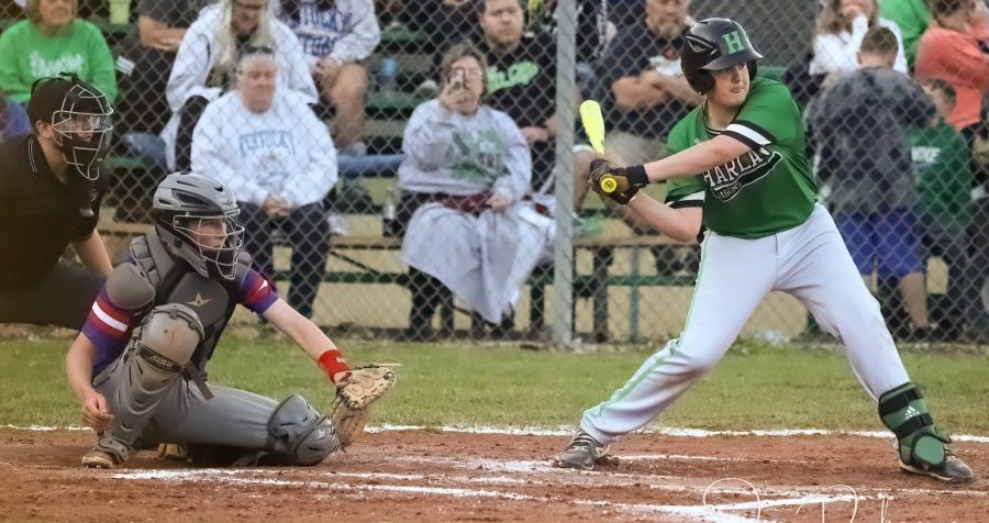 Harlans Eli Freyer, pictured in action earlier this season, collected three hits Wednesday and was the winning pitcher as the Green Dragons rallied for a 13-10 win over visiting Leslie County.
