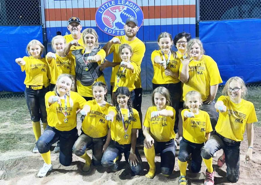 The Harlan County Jeepers completed an 11-0 season in Harlan Little League softball (ages 9-12) to win the league title. Team members include, from left, front row; Riley Owens, Natalie Charles, Chloe Brock, Taylor Glenn, Madison Barrett and Zoey Reed; back row: Bella Miniard, Jordyn Smith, Jaylin Robinson, Adalynn Shackleford, Emily Cooper and Abigail Tolliver; not pictured: Maci Parker. The team is coached by Brad Kelly, Tony Charles and Crystal Miniard.