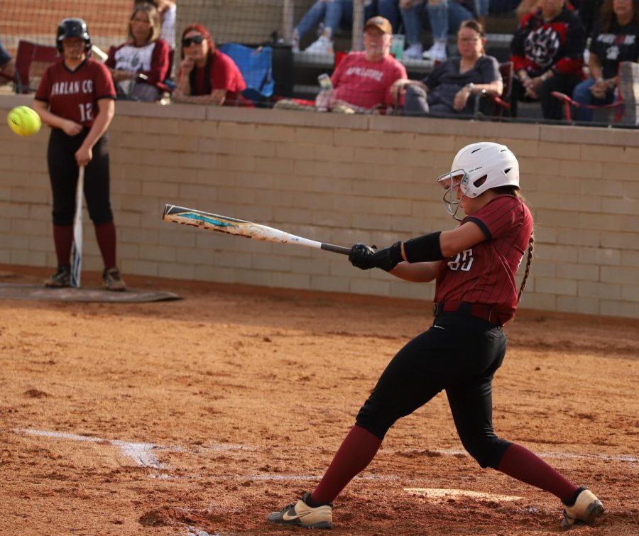 Harlan County catcher Jade Burton connected on one of her four hits in the Lady Bears 7-6 win Tuesday over visiting Harlan.