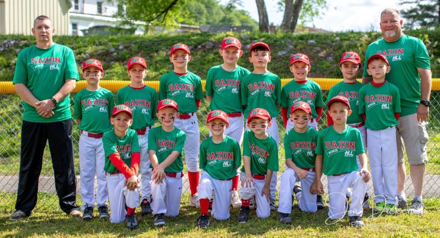 Sazon won the minor league division of the Harlan Little League this season with a record of 12-0. Team members include, from left, front row: Easton Clem, Maverick Helton, Hudson Hacker, Rylan Jenkins, Ben Parsons and Braxton Sizemore; back row: coach John Clem, Nolan Simpson, Benjamin Toll, Colten Hensley, Tripp Ford, Carter Burkhart, Noah Blackwelder, Jonah Doyle, Isaac Combs and coach Jack Maggard