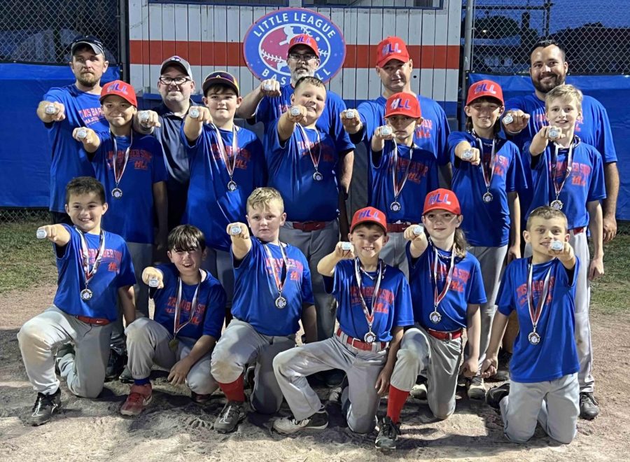 Tim’s Barber Shop won the Harlan Little League (ages 9-12) title with a 12-0 record. Team members include, from left, front row: Maddox Landa, Seth Johnson, Grant Caldwell, Maddox Helton, Kholten Plummer and Cole Lunsford; back row: Karson Yount, Carter Caldwell, Brylee Southerland, Brantley McArthur, Gabriel Helton and Aidan Burnette; coach Doug Caldwell, sponsor Tim Howard, coaches Shaun Burnette, Steven Johnson and Chris Southerland.