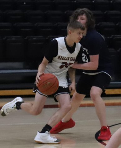 Dalton Halcomb worked around a Knott Central defender in freshman action earlier this summer. Harlan County downed Bell County 45-42 on Monday in a freshman scrimmage.