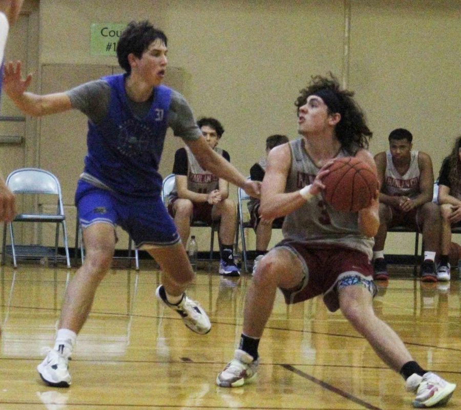 Harlan County guard Maddox Huff worked against North Laurels Reece Davidson in action from the KABC Titans Titans Shootout on Saturday. Huff scored 24 points in the Bears 73-55 victory.