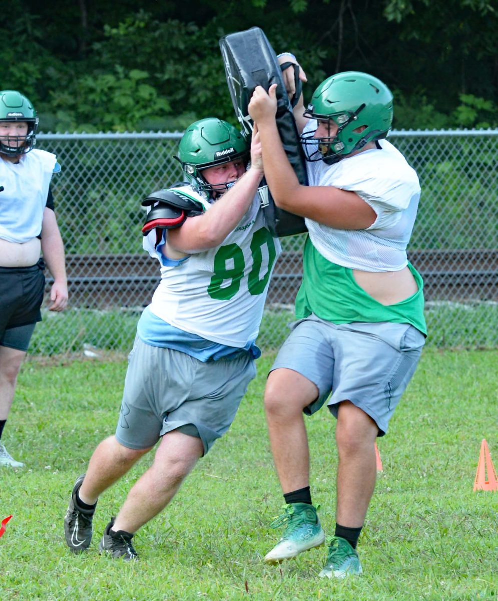 Trenton Childers worked against Malachi Rodriguez during a lineman drill at a recent Harlan practice session.