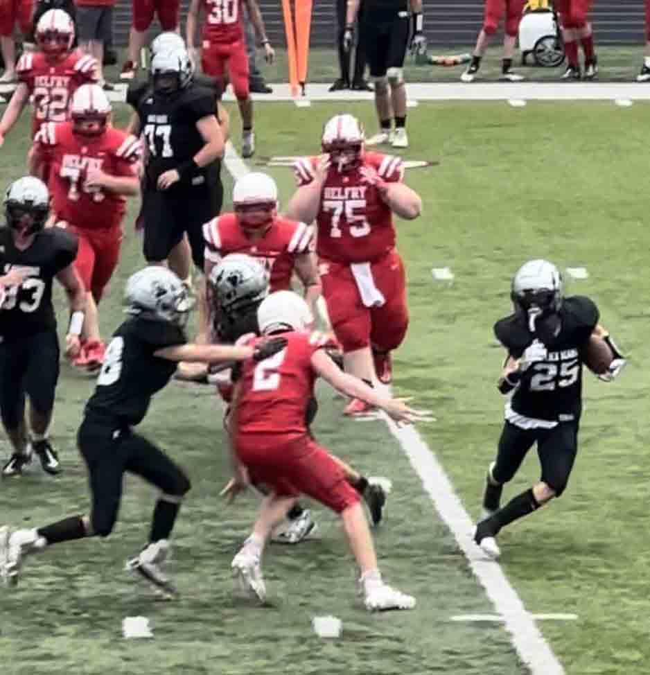 Harlan County running back Brayden Morris looked for running room on the outside during the Bears’ 12-6 win over visiting Belfry on Saturday.