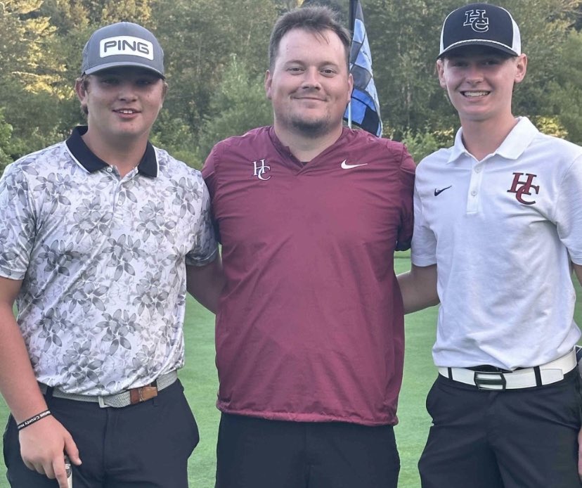 Harlan+County+High+School+golfers+Brayden+Casolari+%28left%29+and+Cole+Cornett+are+pictured+with+HCHS+golf+coach+Brendan+Rutherford.+Cornett+was+first+in+a+conference+tournament+Tuesday+in+Barbourville+with+a+38%2C+two+strokes+ahead+of+Casolari%2C+who+finished+second.