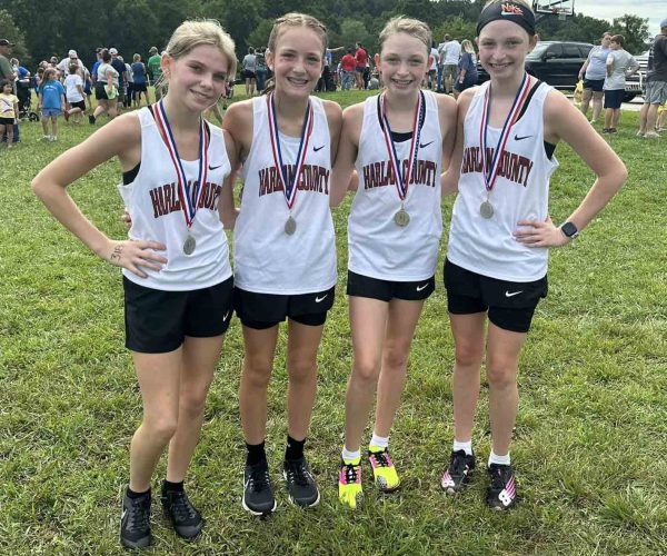 Harlan County runners Charli Shepherd, Jaycee Simpson, Kiera Roberts and Gracie Roberts each topped the previous 3K school record as the Lady Bears won the season-opening middle school race at Lynn Camp. Gracie Roberts placed first, while Kiera Roberts was third, Shepherd was fourth and Simpson was fifth.