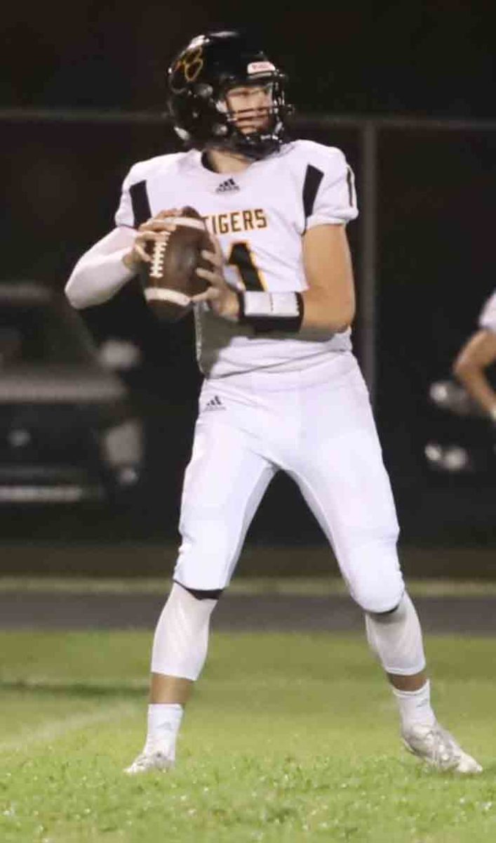 Clay County senior quarterback Tate Rice threw for four touchdowns and 227 yards while completing 13 of 16 passes as the Tigers won 46-6 at Harlan on Friday.