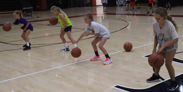 The Harlan County Basketball Camp opened Monday at the HCHS gym with 44 campers participating. Several girls at the camp worked on ball handling. The camp continues through Wednesday.