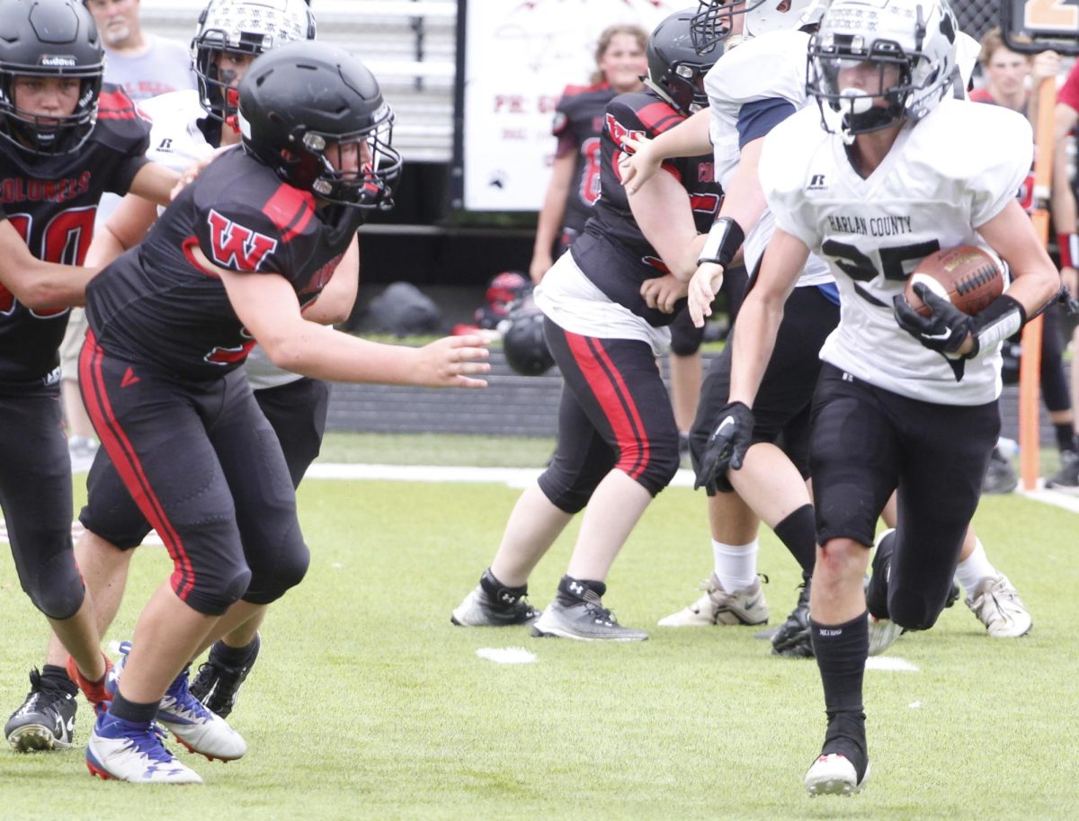 Harlan County running back Brayden Morris ran for 368 yards and seven touchdowns in the Bears 54-34 win Saturday over visiting Whitley County.