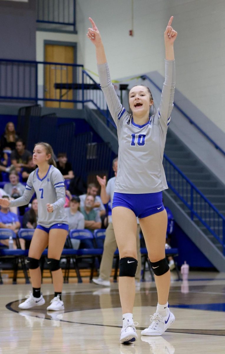 Bell County senior Gracie Jo Wilder celebrated after one of her 20 kills on Tuesday during the Lady Cats three-set win over visiting Harlan County.