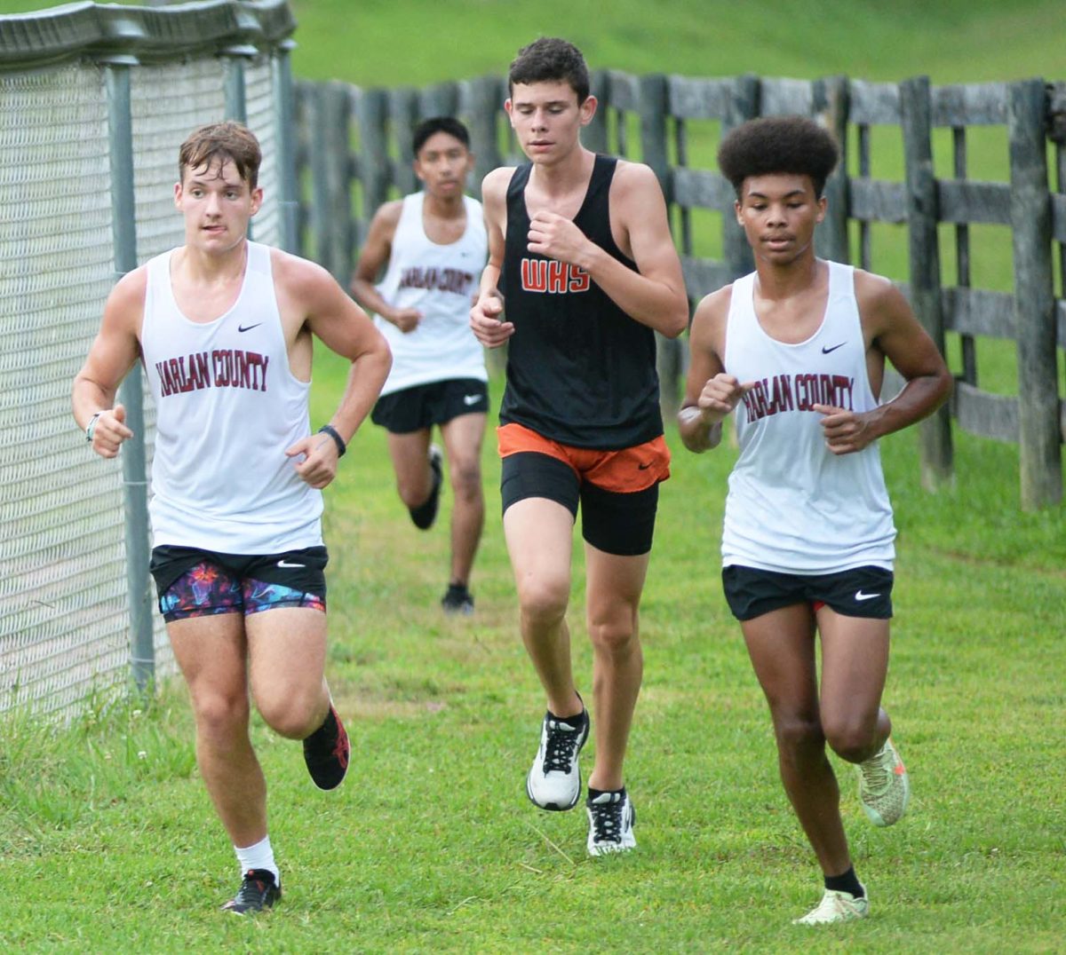 Harlan County runners Ethan Simpson (left) and DaShaun Smith competed in a meet Tuesday at Harlan County High School.