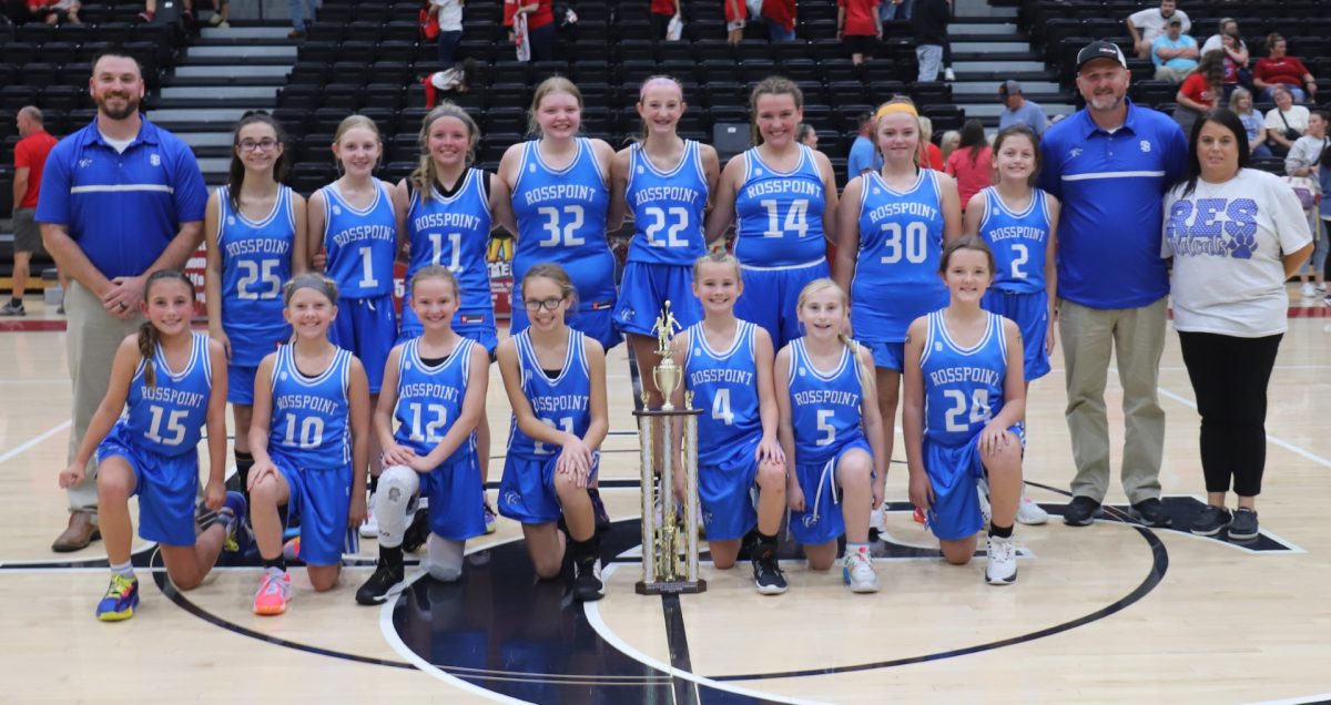 The Rosspoint Lady Cats captured their fourth straight fifth- and sixth-grade county championship with a 40-15 win Thursday over Cawood. Team members include, from left, front row: Natalie Creech, Paislee Boggs, Annie Burton, Zoey Reed, Andrea Napier, KenLee Blevins and McKenzie Adams; back row: coach Johnny Simpson, Abigail Collins, Madi Woods, Taylynn Napier, Barbara Osborne, Brooklyn Daniels, Crissalynn Jones, Aaliyah Webb, Morgyn Belcher, assistant coach Randy Daniels and bookkeeper Kim Hensley.