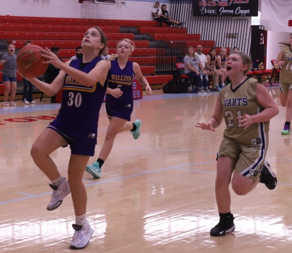 Wallins Kylee Runions coasted to the basket in action against Evarts from the county tournament on Saturday.