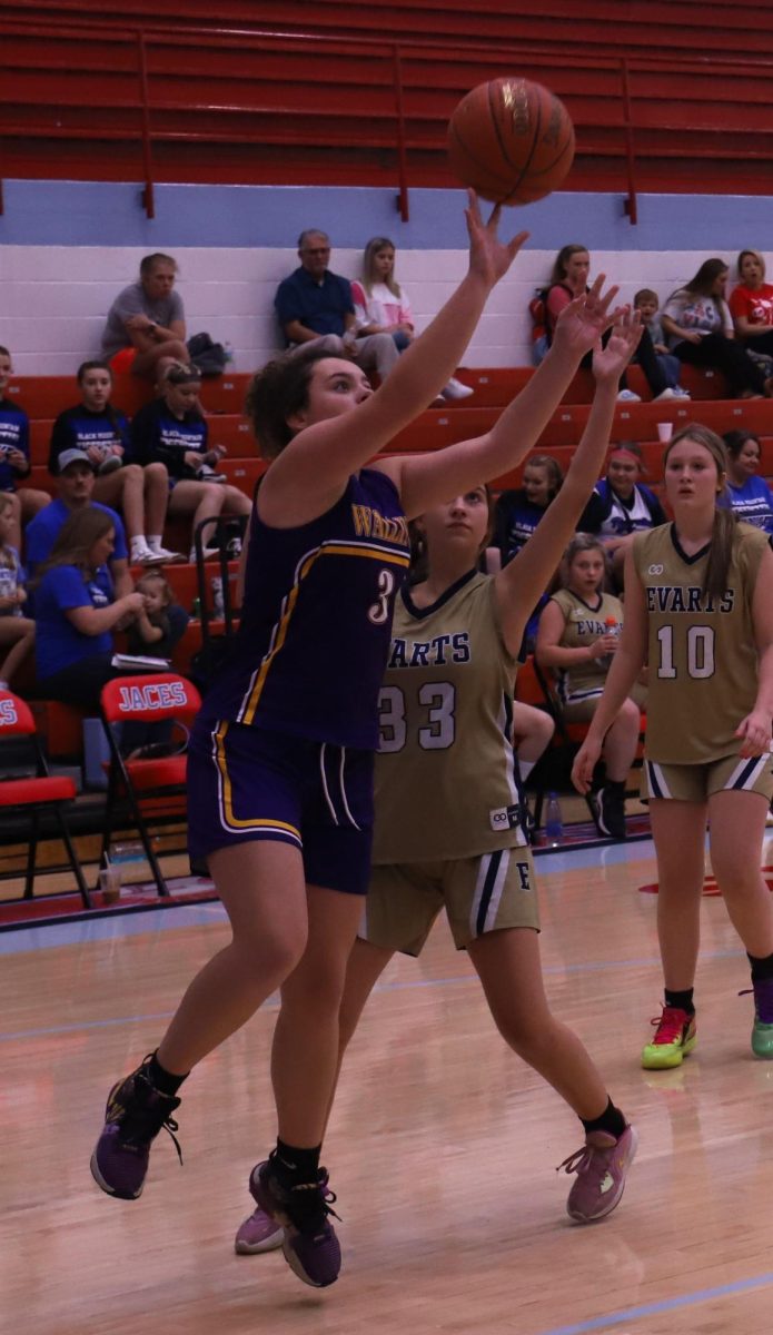 Wallins guard Raegan Landa went in for two of her seven points in the Lady Devils win over Evarts on Saturday in the seventh- and eighth-grade county tournament.