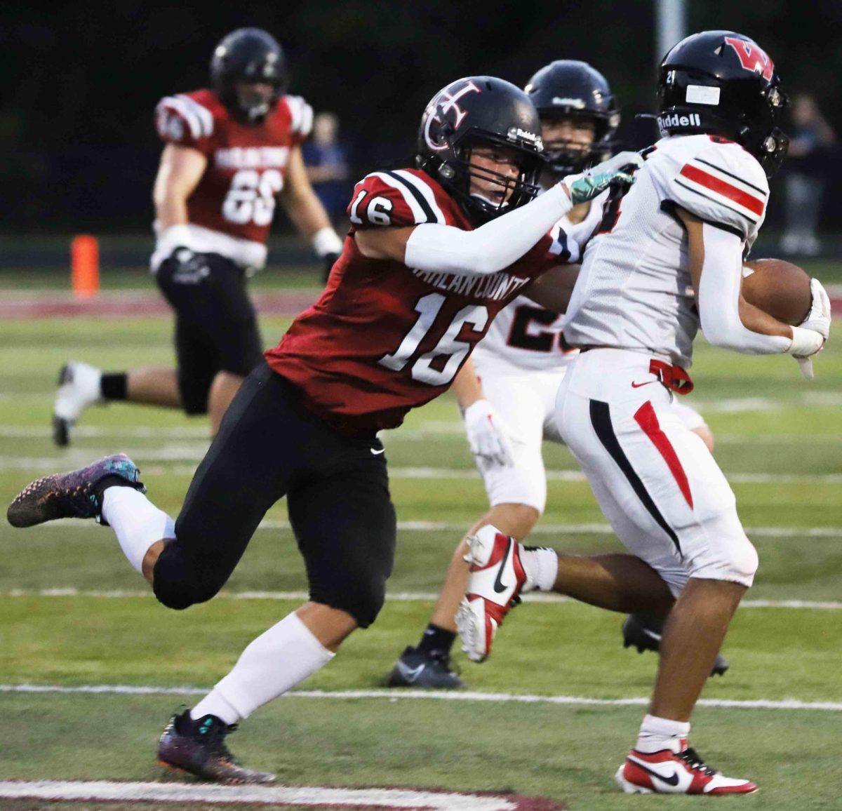 Harlan County defensive back/receiver Luke Kelly moved in for a tackle earlier this season. Kelly had a 90-yard touchdown catch and added an interception on Friday, but it wasnt enough for the Bears in a 44-20 loss.
