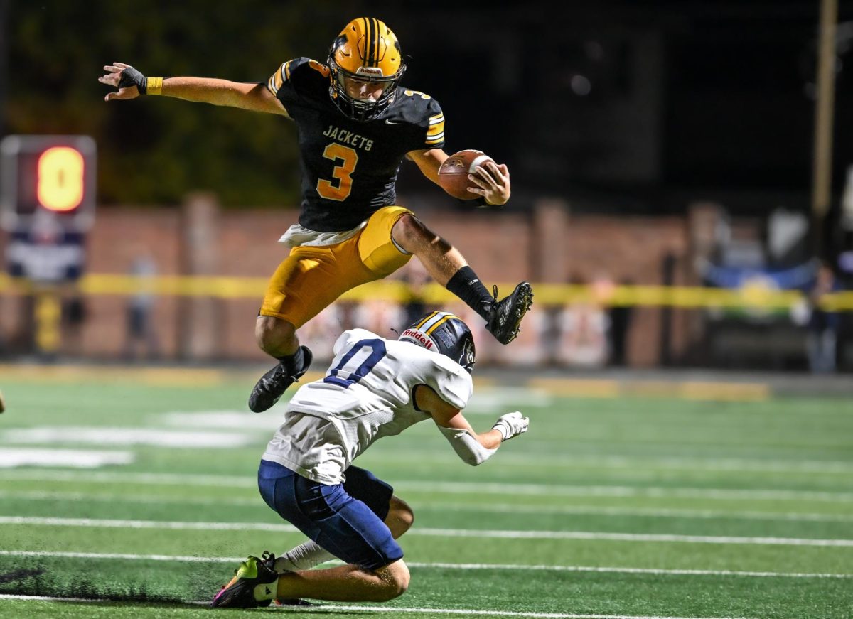 Middlesboro senior running back Rylee Foster went airborne over a Knox Central defender in Fridays game. Foster ran for 156 yards and two touchdowns in the Jackets 57-28 victory.