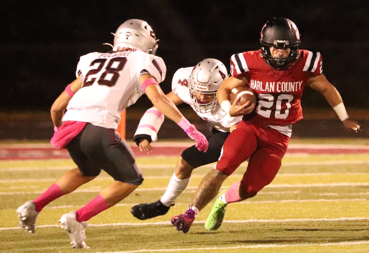 Harlan County running back Thomas Jordan picked up yardage early in Fridays game against visiting Pulaski County. The Maroons rolled to a 53-6 victory.