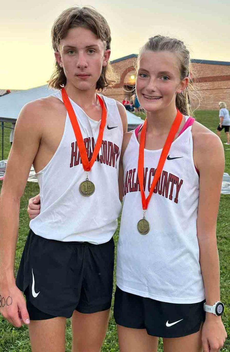 Harlan County eighth graders Tanner Daniels and Lauren Lewis were the individual champions Monday during the 13th Region middle school meet.