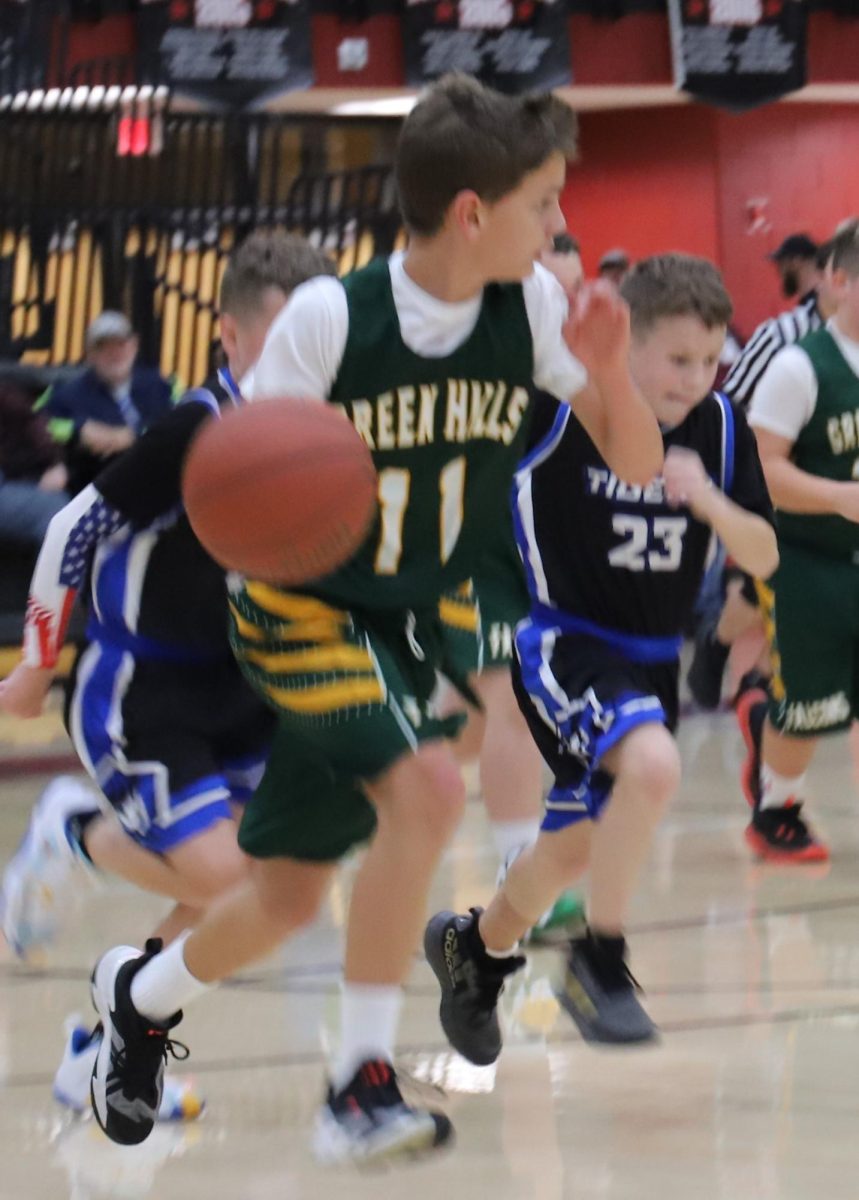 Green Hills guard Billy Harrison led a fast break in action from the Black Bears Panorama on Friday. Harrison scored 12 points in the Falcons win over Black Mountain.