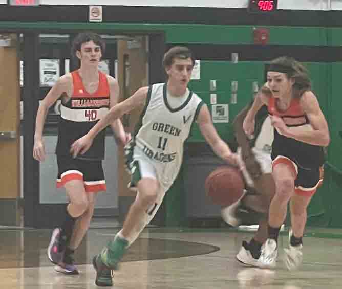 Harlan guard Jaxson Perry raced down the court in Mondays middle school game against visiting Williamsburg. Perry scored 16 points on Tuesday as the Dragons defeated Middlesboro 47-38.