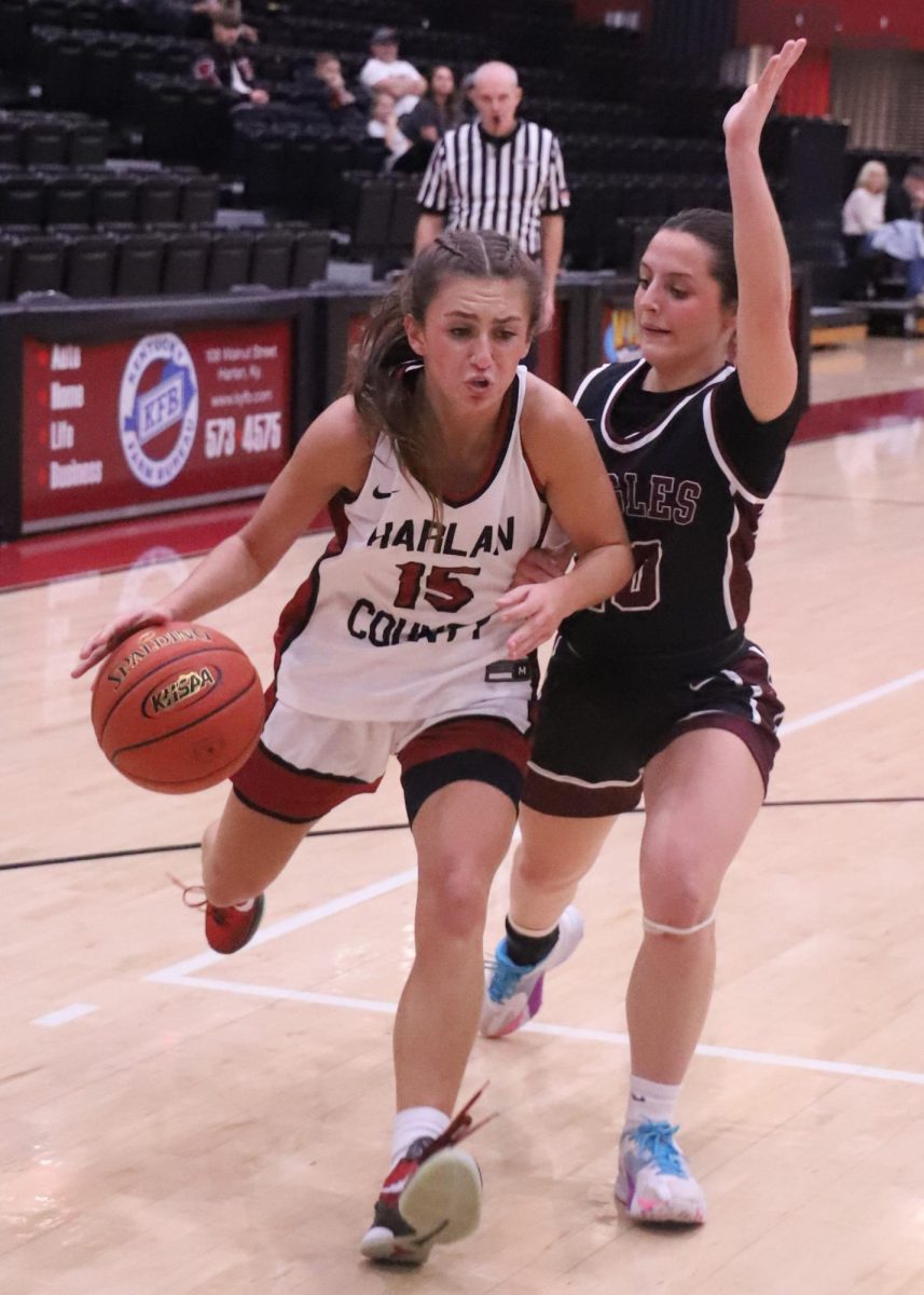 Harlan Countys Ella Karst drove to the basket in Thursdays game against Leslie County. Karst scored 29 points to lead the Lady Bears in their 63-57 loss.