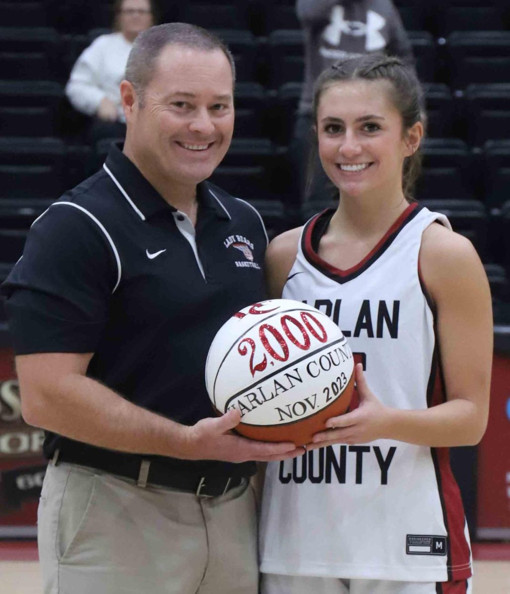 Harlan+County+senior+guard+Ella+Karst+was+honored+before+Thursdays+game+against+Leslie+County+after+reaching+the+2%2C000-point+plateau+for+her+high+school+career.