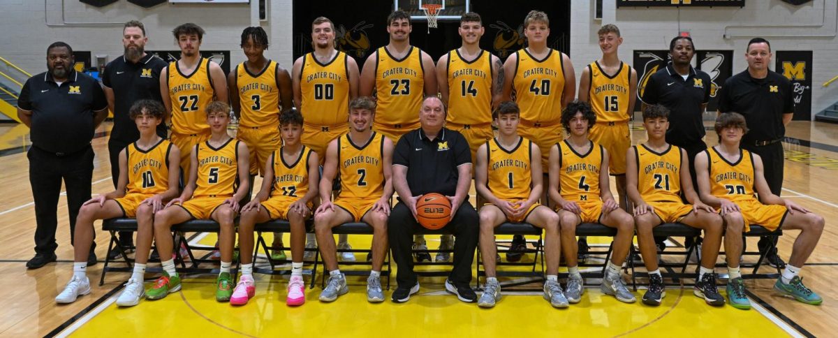 Team members include, from left, front row: Bryson Brooks, Joseph Killion, Amari Houston, Cayden Grigsby, coach John Wheat, Brayden Barnard, Chandlier Cox, Mehki Young and Anthony Miracle; back row: assistant coach Ed Gilbert, assistant coach/ATC Byron Asher, Jack Smith, Jeremiah Beck, Bryce Bowling, Trey King, Peyton Turner, Brady Hatmaker, Aiden Larew, assistant coach Eddie Gilbert, assistant coach Steve Barnard; not pictured: assistant coach Blake Davis.